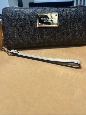 Michael Kors Brown Logo-Print Wristlet with Beige Strap smoke/pet free home